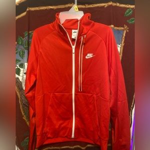 Nike light white windbreaker suit normal price 135.00 it’s a size men’s medium